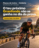 Planos de treino de ciclismo CTAD: o teu próximo Granfondo não se ganha no dia da prova; ciclista numa estrada costeira